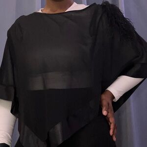Patra- Sheer poncho with feather attachment